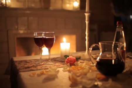 depositphotos_190835668-stock-video-loving-couple-having-supper-candlelight